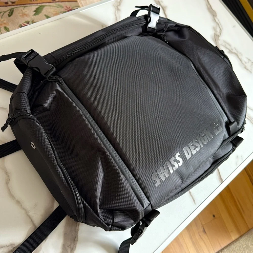 NEW* Men's Swiss Design Black Travel Backpack.  7 seperate storage compartments.